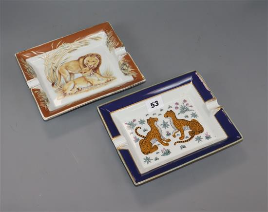 Two Hermes ashtrays, one decorated with a lion and lioness, the other leopards